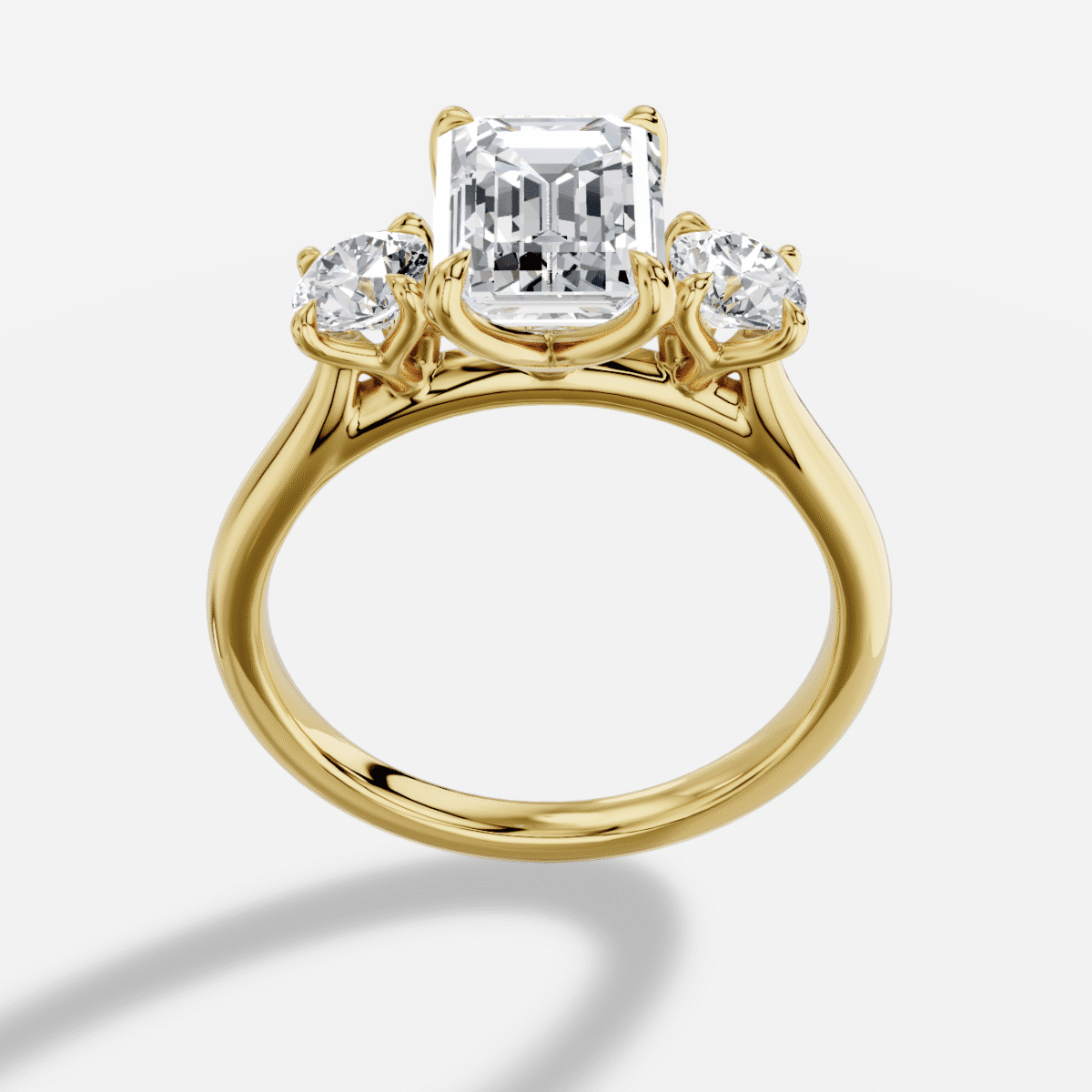 Emerald Cut Three Stone Diamond Ring  in 18K Yellow Gold