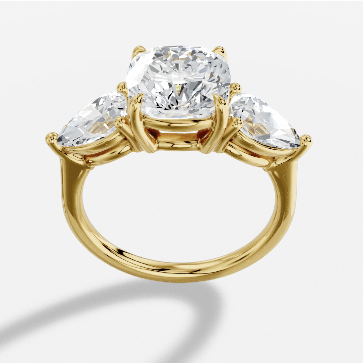 Cushion  Three Stone Diamond Ring in 18K Yellow Gold